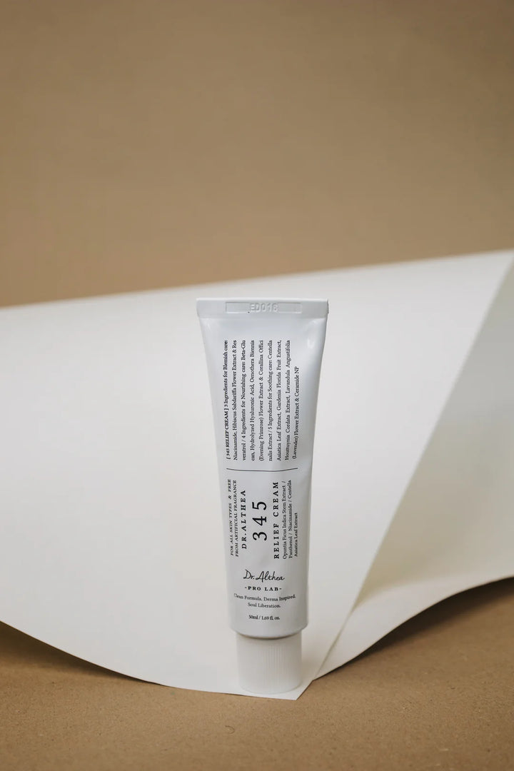 Nuaglow Lenas rutine skincare products arranged on a clean surface with soft lighting.