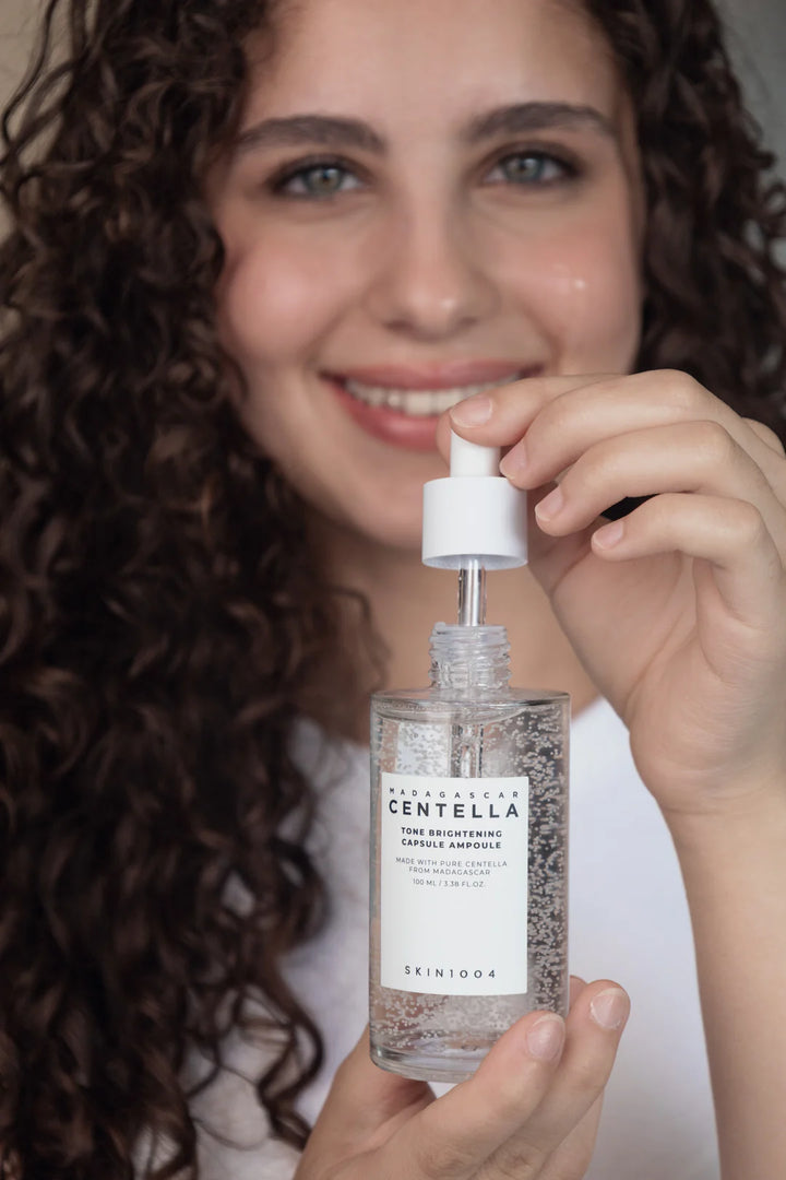 Nuaglow skincare routine for pigmentation, featuring various creams and serums in a neatly arranged set for skin brightening.