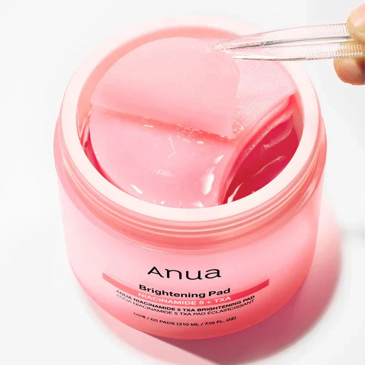 Nuaglow skincare routine with Anua-brightening pads, featuring a close-up of the brightening skincare pads in a sleek container.