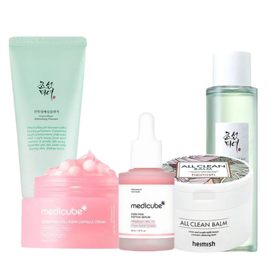 Nuaglow 5-trins rutine til fine linjer og rynker, vises i elegant emballage, featuring skincare products for anti-aging.