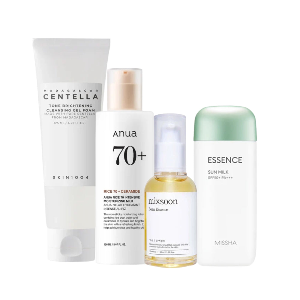 Nuaglow Sommerglød skincare routine with various products arranged neatly, featuring bottles and jars for a radiant summer glow.