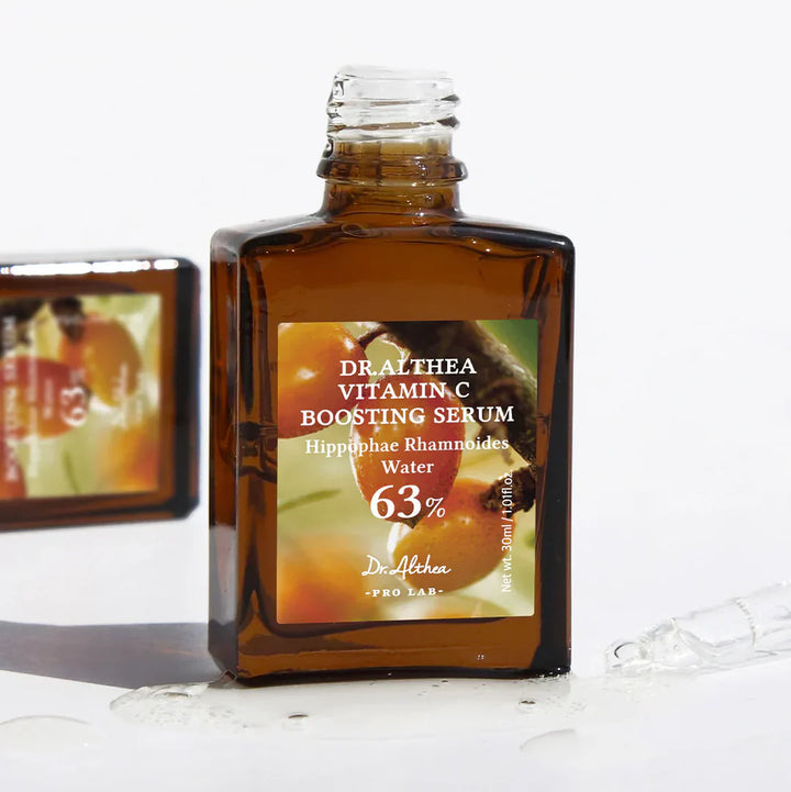 Nuaglow Maryams 4 favoritter skincare routine with Dr. Althea Vitamin C Boosting Serum in a sleek bottle.