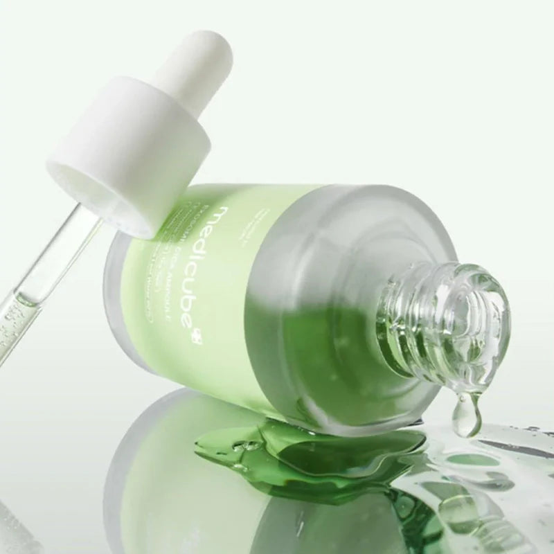 Medicube Exosome Cica Serum 30ml in a clear glass bottle with dropper, designed for soothing and revitalizing skin.