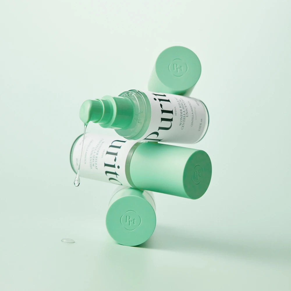 Purito Wonder Releaf Centella Serum Unscented in 60ml bottle, clear glass container with dropper for skincare application.
